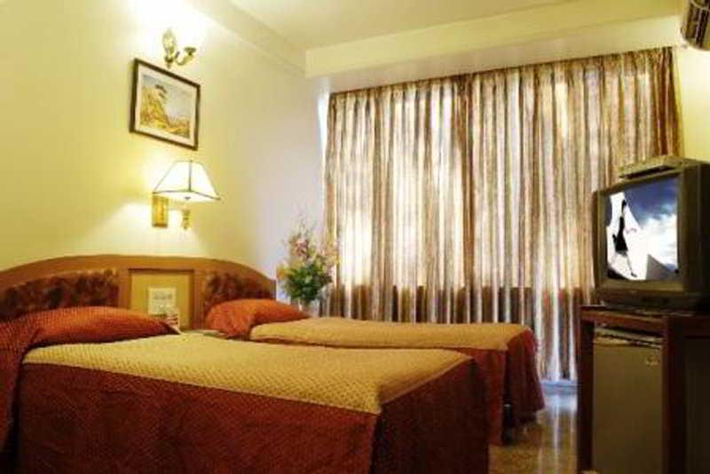 Hotel Mandakini Ambience Poona Kamer foto