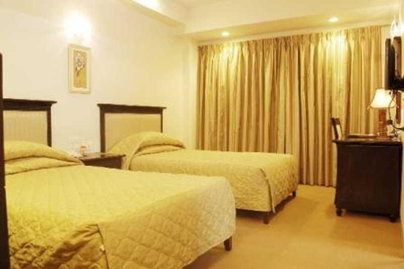Hotel Mandakini Ambience Poona Kamer foto